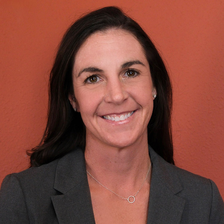 Meggan Hathaway, Attorney - professional head shot in law office